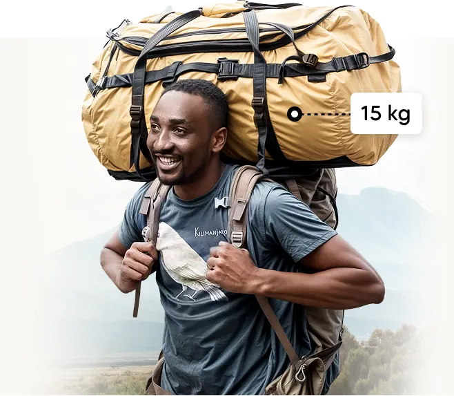 Porteador del Kilimanjaro cargando una bolsa de expedición de 15 kg Porteador del Kilimanjaro cargando una bolsa de expedición de 15 kg